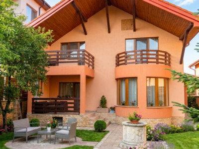 Casă individuală cu 6 camere, 2 garaje și grădină amenajată – Bună Ziua